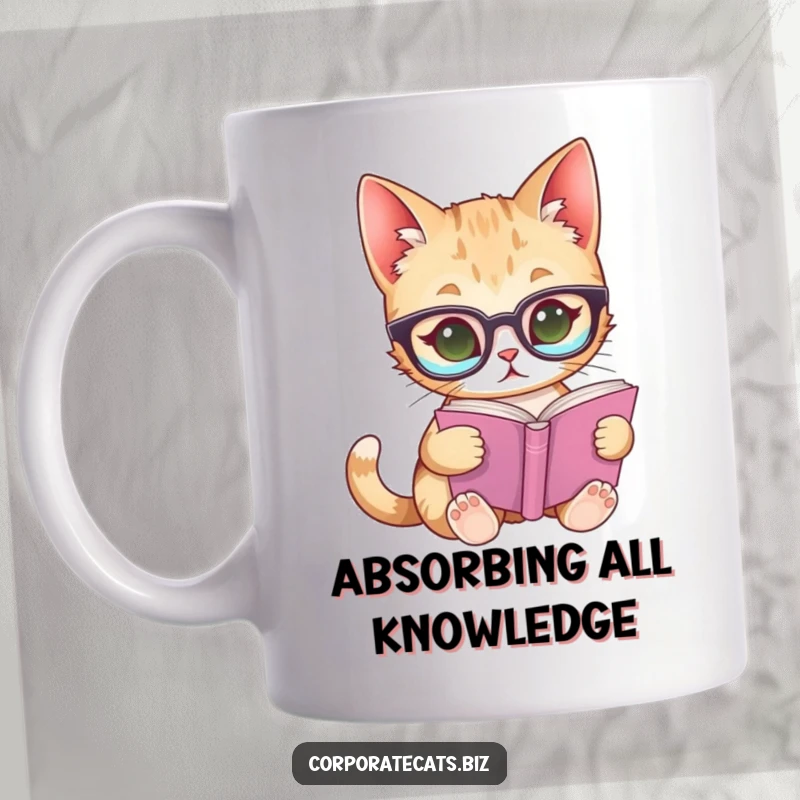 Funny mug depicting a curious cat wearing glasses, engrossed in reading a tiny book, promoting intellectual humor.