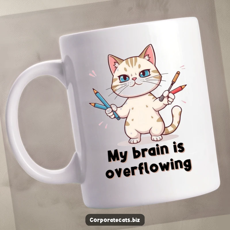 Funny mug showing a determined cartoon cat expertly juggling many pens, capturing the relatable chaos of a busy workday.