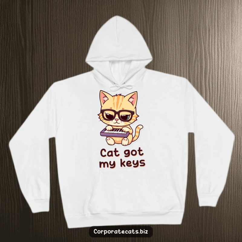 Funny cat hoodie with a mischievous, bespectacled cat character focused on playing a miniature keyboard, looking like a hacker.