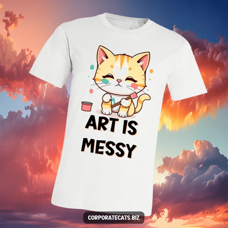 Funny T-Shirt: A comical cat artist has vibrant paint smeared across its face, looking surprised and slightly bewildered.